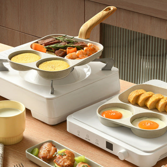 Multifunctional kitchen appliance with cooking utensils on a wooden table