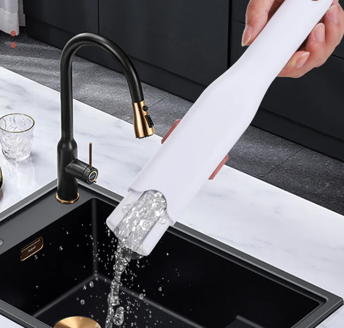 Person using a white mini portable cleaning mop.