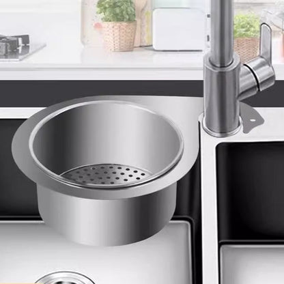 Stainless steel sink strainer on a kitchen sink with SUS201 text